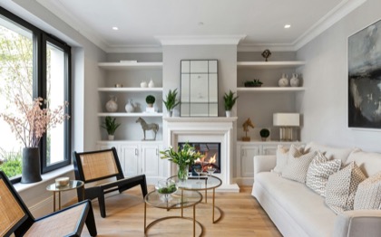 A bright, tidy living room after a cleaning visit